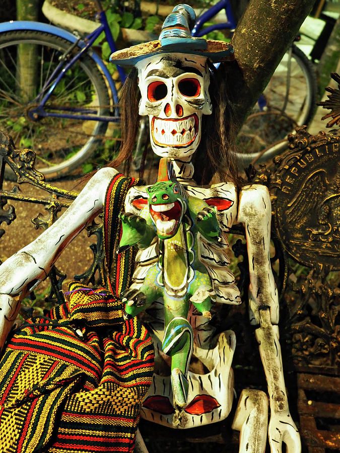 A Skeleton On A Bench In Tulum Photograph