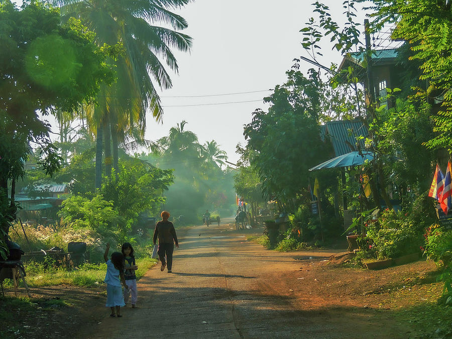 A sleepy early morning in the village in NE Thailand Photograph by Jeremy Holton
