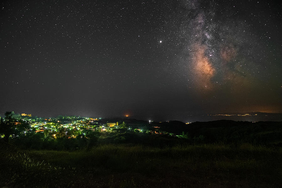 A Small Village Under The Milky Way Photograph