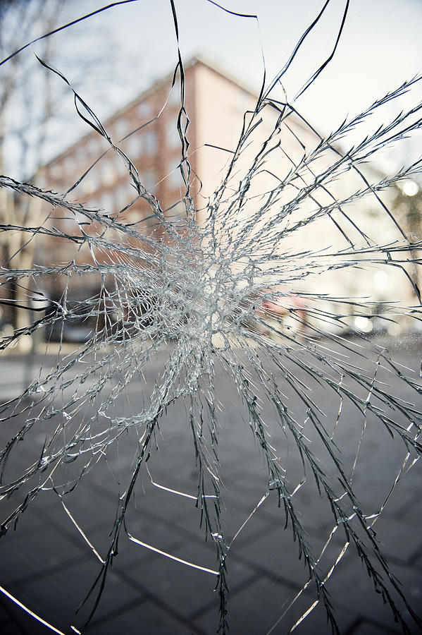 A smashed pane of glass Sweden. Photograph by Alexander Crispin