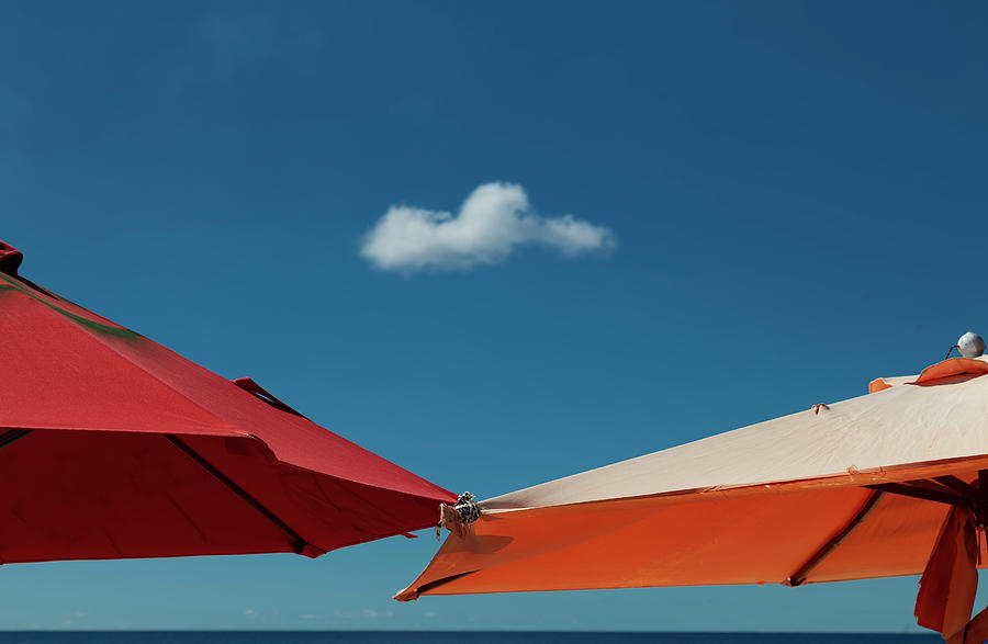 A solo cloud and parasols Photograph by Leighton Collins - Fine Art America