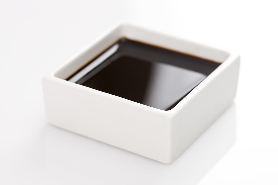 A square container of soy sauce Photograph by Aleaimage