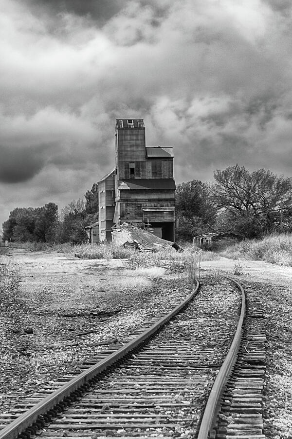 Black And White Photograph - A Stop on Charlie the Choo-Choos Line by Guy Shultz