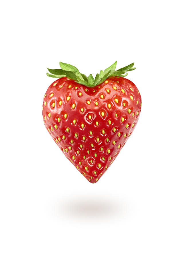 A strawberry in the shape of a heart Photograph by Hdere