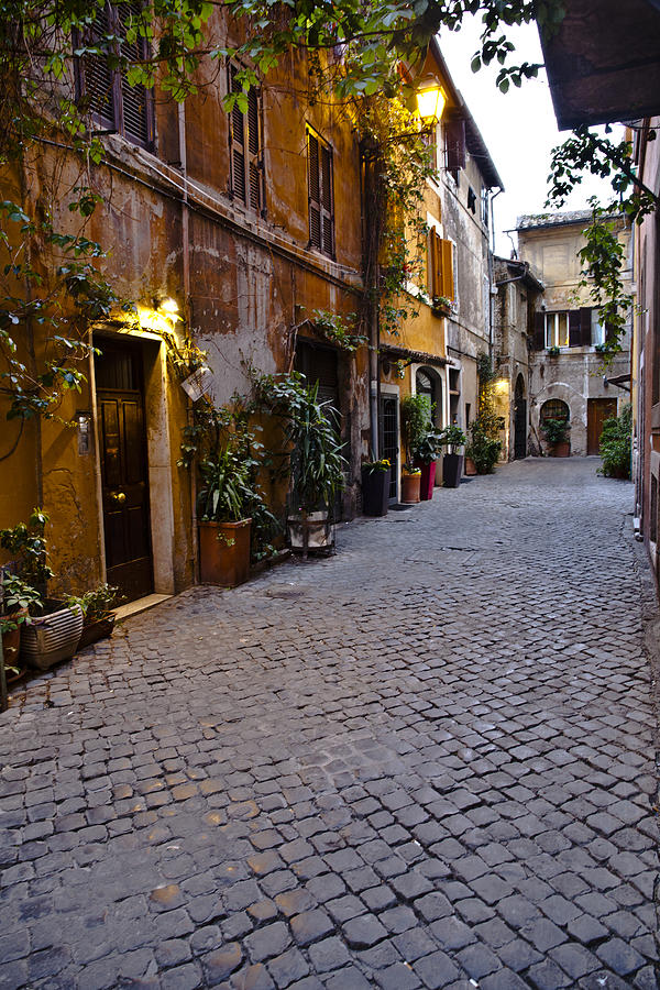 A street in the Trastevere section of Rome Photograph by Thomas Roche