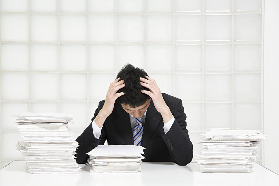 A stressed office worker Photograph by Image Source