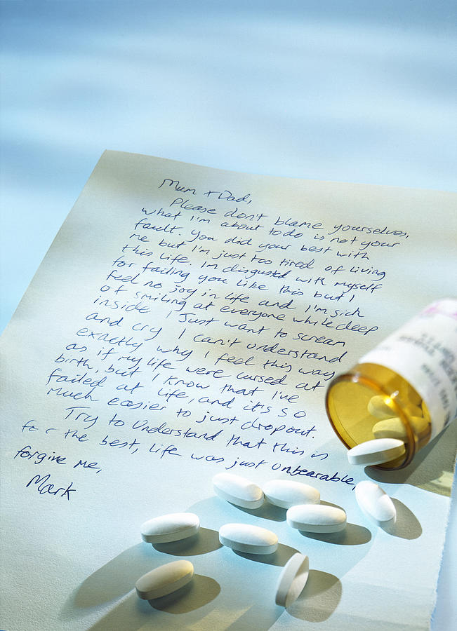 A Suicide Note With An Open Vial Of Medical Pills Photograph by Stockbyte