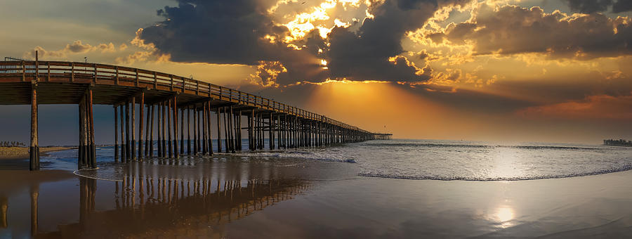 A Sunset at the Pier Photograph by Marcus Jones