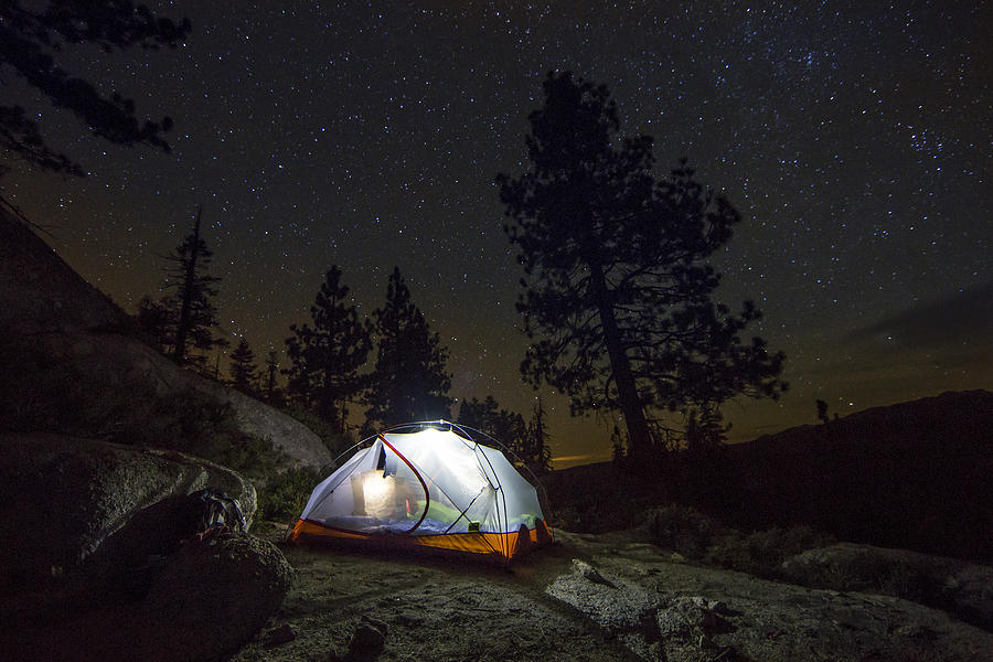 A tent under the night sky. Photograph by Jordan Siemens