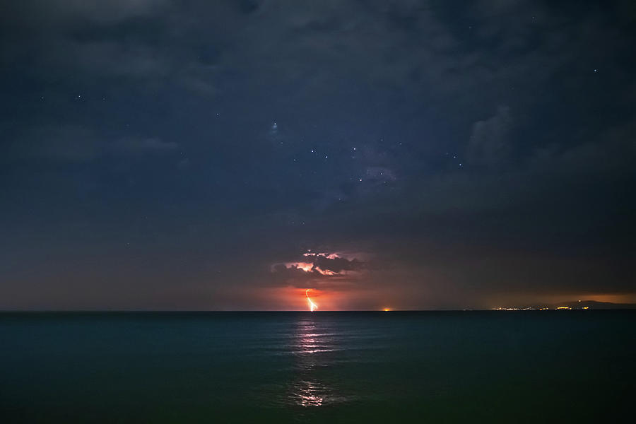 A Thunder Strikes Into The Sea Photograph