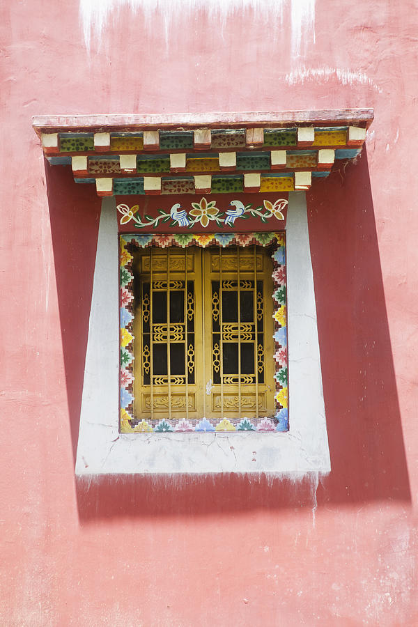A traditionally painted Tibetan window Photograph by Rawfile Redux