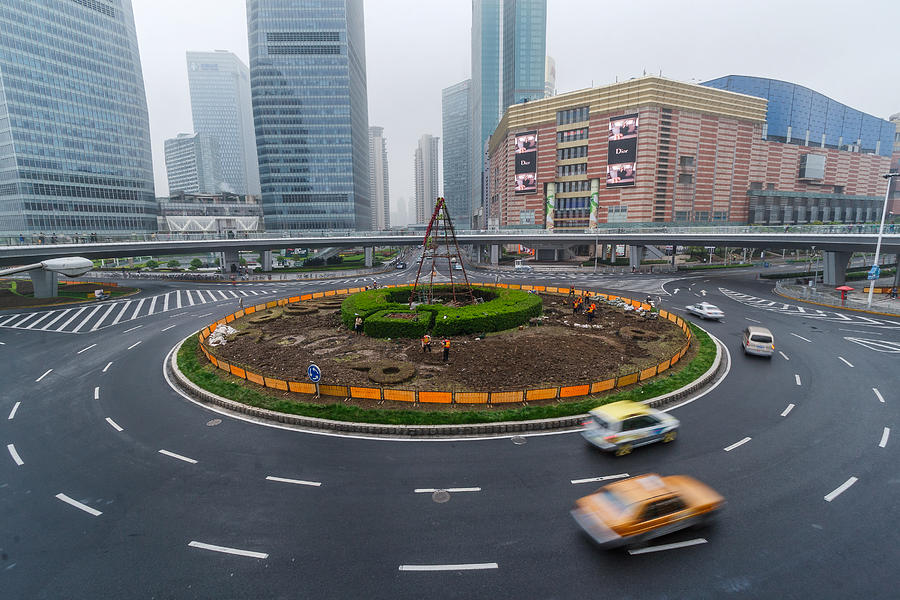 A traffic roundabout in Pudong, Shanghai Photograph by Philippe Marion