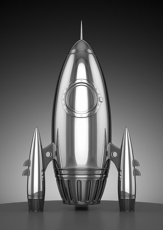 A uniquely shaped chrome rocket ship  Photograph by Goktugg