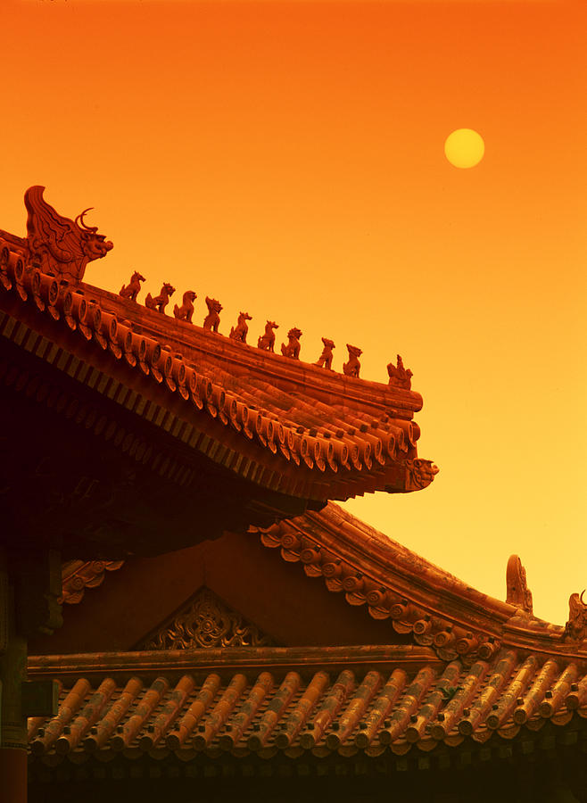 A Vertical Warm Abstract Photo Of A Traditional Chinese Temple Roof Photograph by Rubberball
