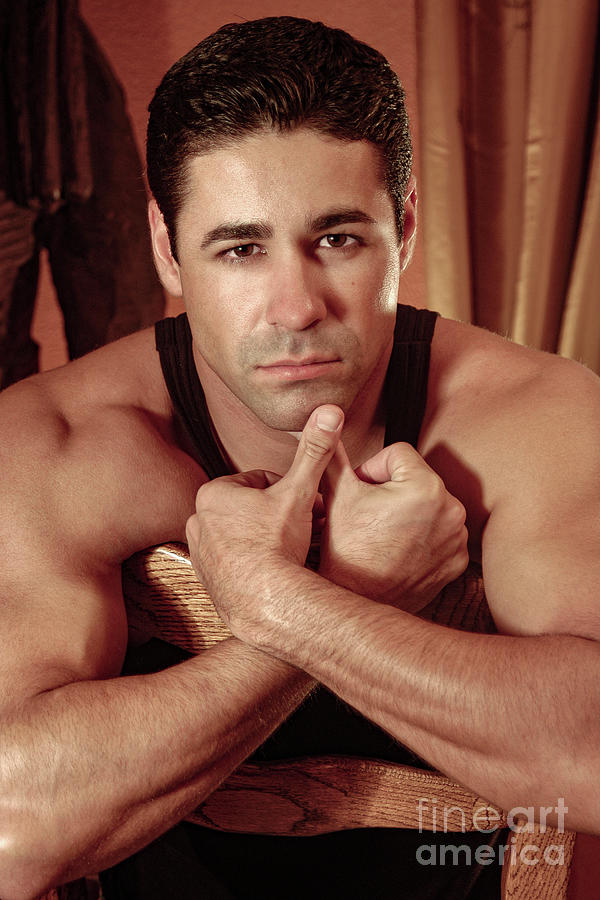 A very handsome Hispanic male provocative portrait. Photograph by Gunther Allen