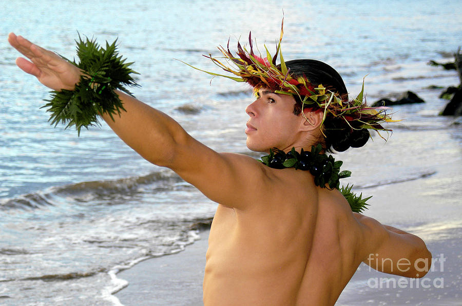 A very handsome male hula dancer poses Photograph by Gunther Allen