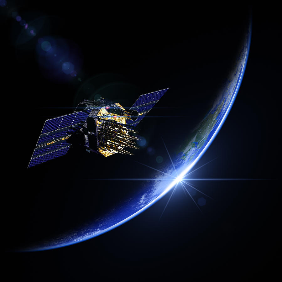 A view of a satellite during sunrise in space Photograph by BlackJack3D