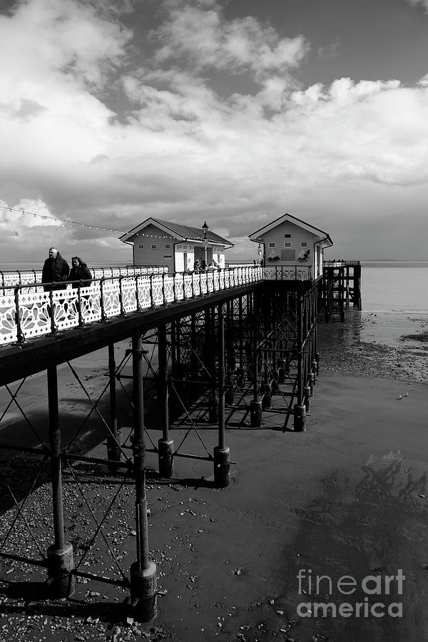 A walk along Penarth Pier in black and white South Wales Photograph by James Brunker