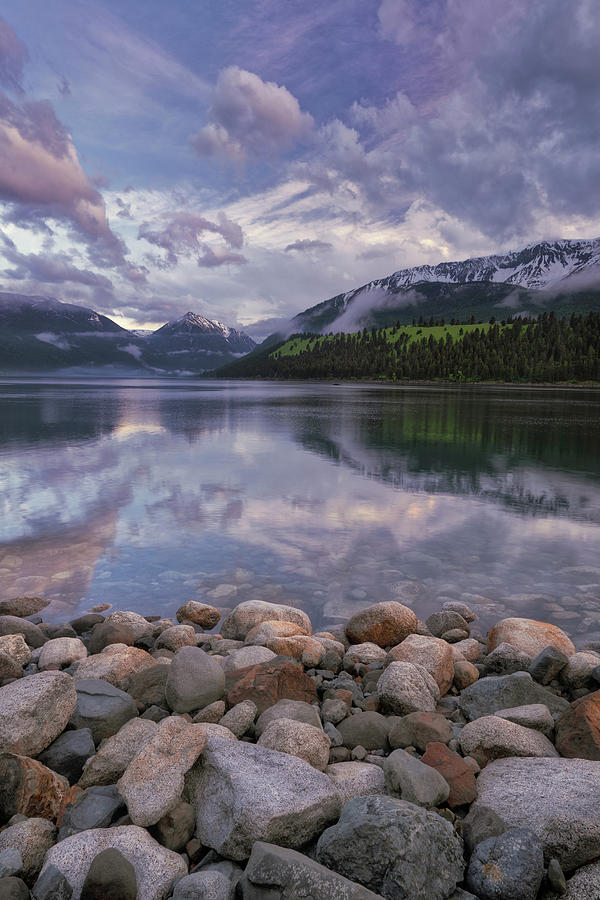 A waters edge view of the Wallowa Mountains reflecting into Wallowa ...