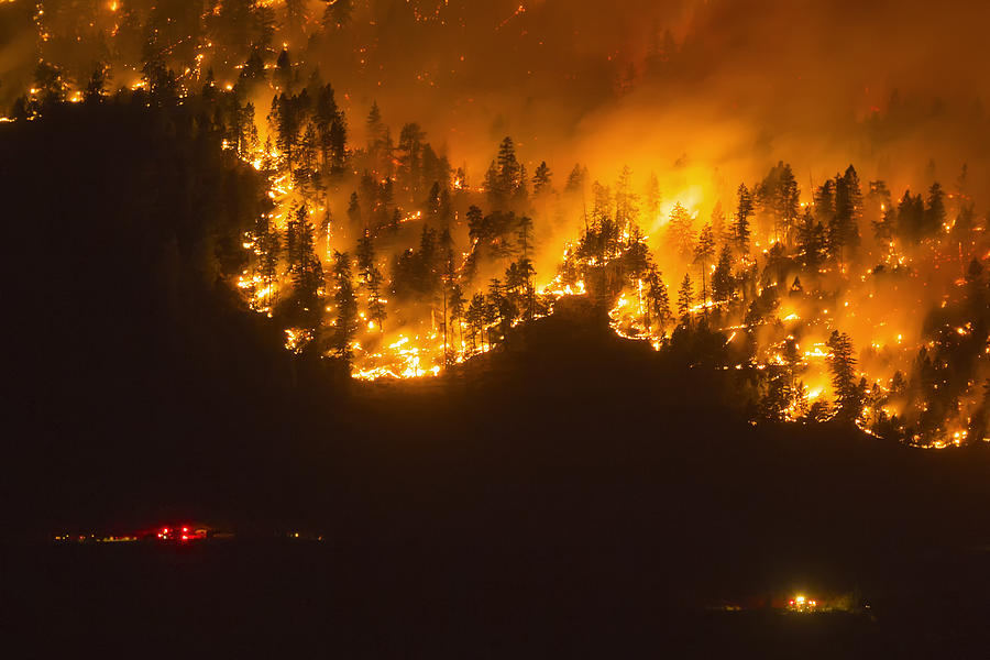 A wildfire frontline with emergency services nearby, Okanagan Valley, British Columbia, Canada Photograph by Nick Fitzhardinge