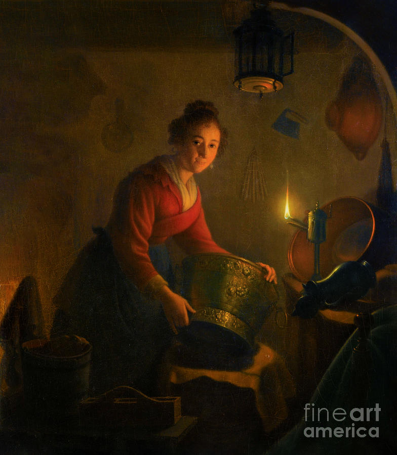 A Woman In A Kitchen By Candlelight Photograph