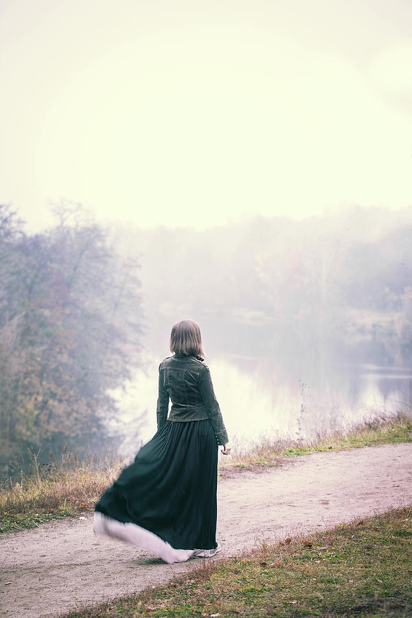 A Woman In A Long Dress Photograph