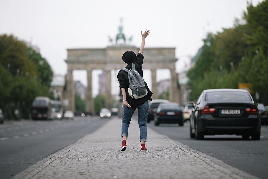 A Woman Waving To Brandenburg Gate Photograph by Willie B. Thomas