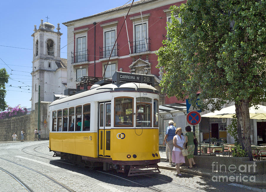 A yellow Lisbon tramcar Photograph by Mikehoward Photography