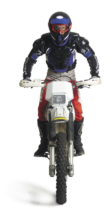 A Young Caucasian Male Dirtbiker Sits Upon His Motorcycle And Races Forward Photograph by Photodisc