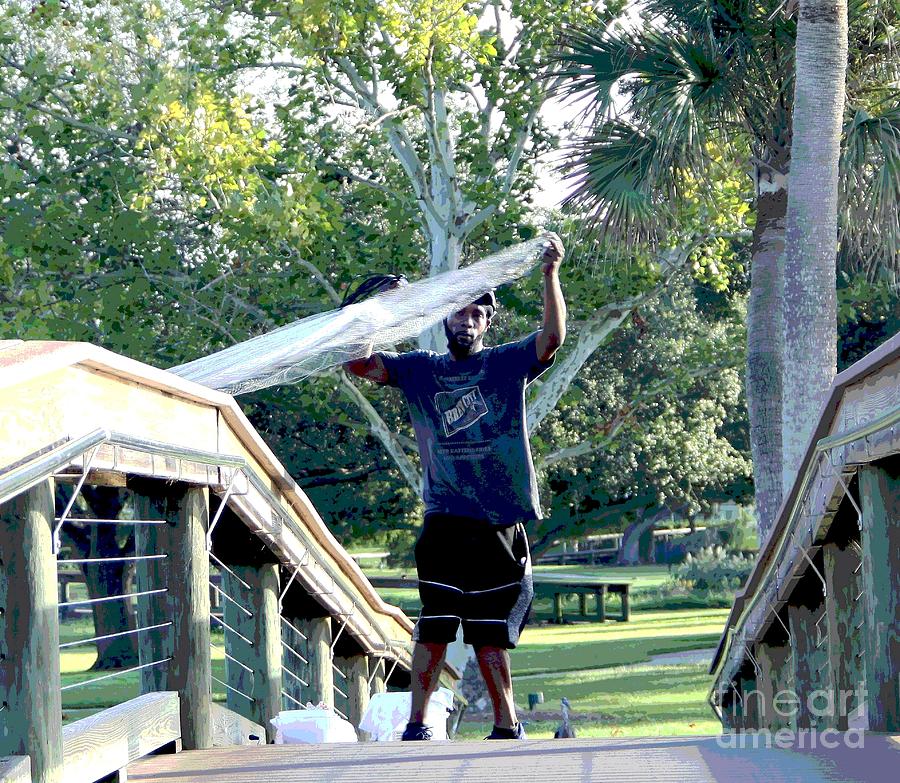 A Young Man Casts His Bait Net As He Anticipates A Great Day Of Pole Fishing Photograph by Philip And Robbie Bracco