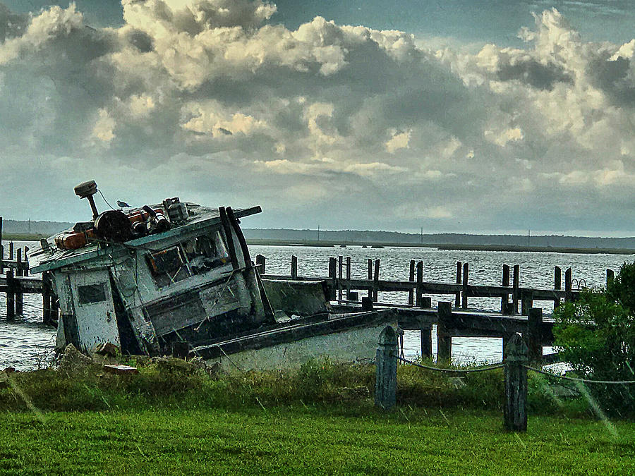 Abandoned boat Photograph by Stephen Dorton