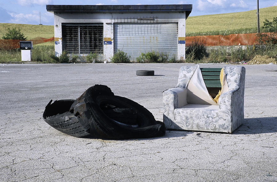 Abandoned Gas Station with Damaged Armchair.Rural Scene Photograph by Lisa-Blue