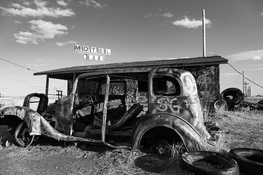 Abandoned painted car on Historic Route 66 in Texas in black and white Photograph by Eldon McGraw