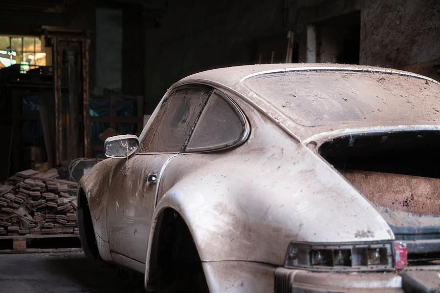 Abandoned Porsche in Garage Photograph by Roman Robroek