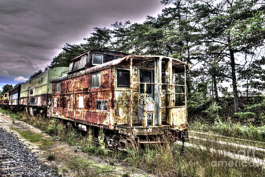 Abandoned Rail Cars Rusting Away Photograph by Brad Knorr - Fine Art ...