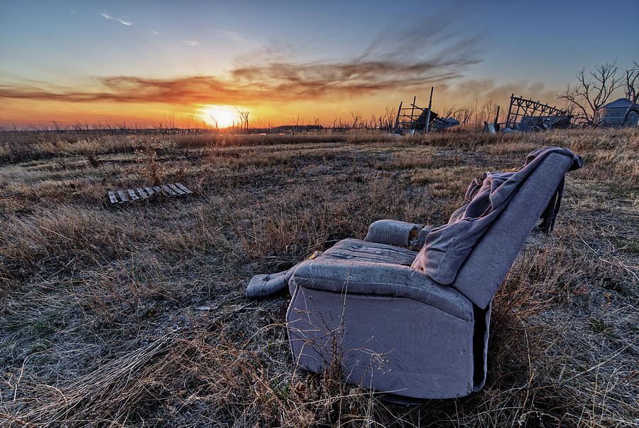 Abandoned Recliner Sunset - sunset at an abandoned farm homestead in ND Photograph by Peter Herman