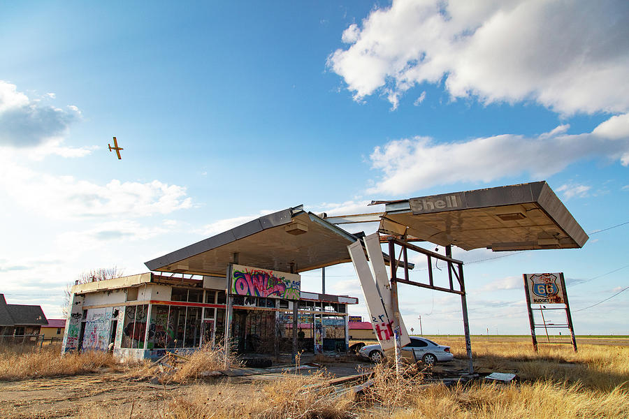 Abandoned Route 66 Budget Fuel gas station in Texas Photograph by Eldon McGraw
