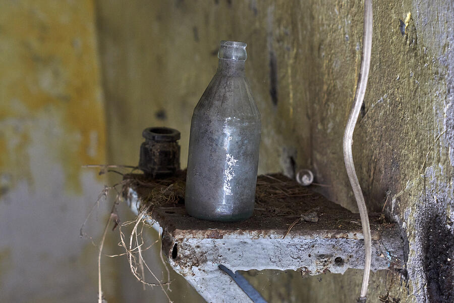 Abandoned secret soviet military base - bottle on a shelf Photograph by Peter Gedeon