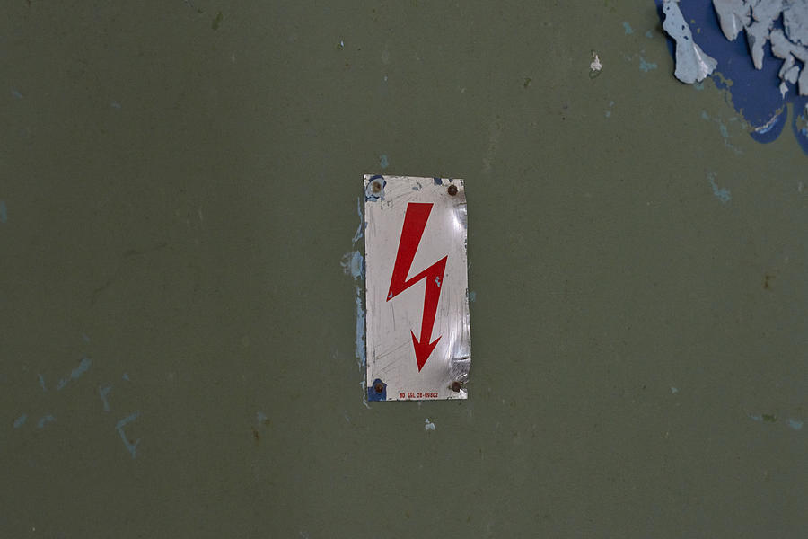 Abandoned secret soviet military base - power sign Photograph by Peter Gedeon