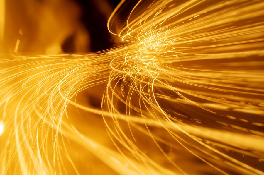 Abstract fire and light trails and effects Photograph by John Rensten