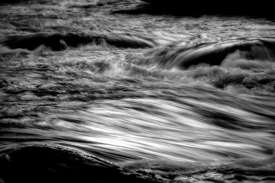 Abstract of fast flowing water Photograph by Dan Friend
