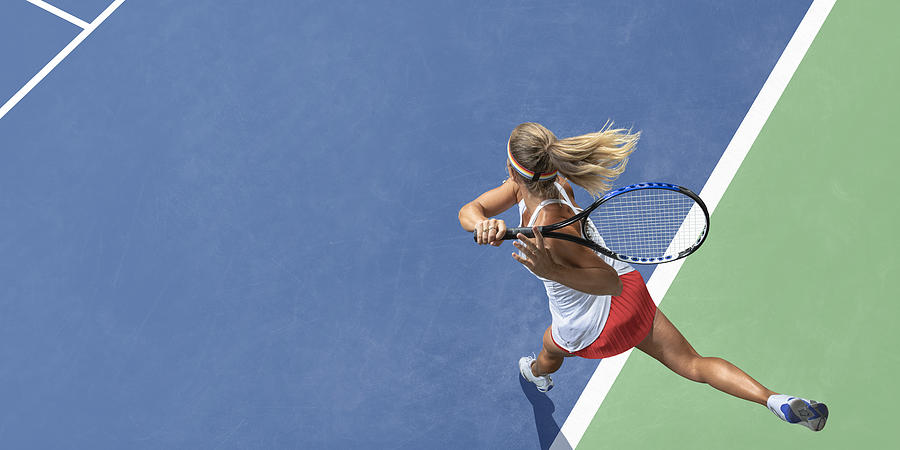 Abstract Top View Of Female Tennis Player After Serve Photograph by Peepo