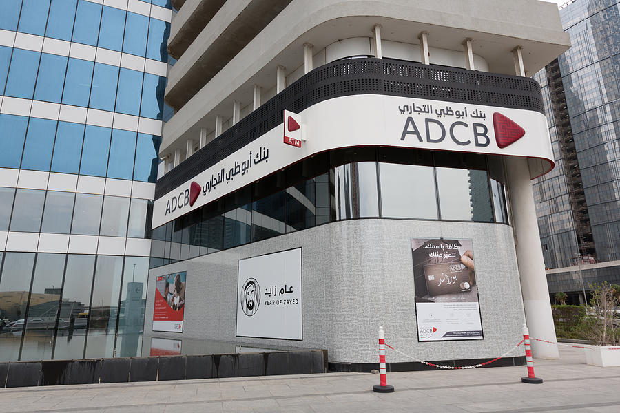 Abu Dhabi Commercial Bank (ADCB) in Dubai, United Arab Emirates Photograph by Winhorse