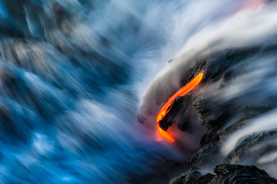 active lava with flowing water at big island, Hawaii, USA Photograph by SinghaphanAllB