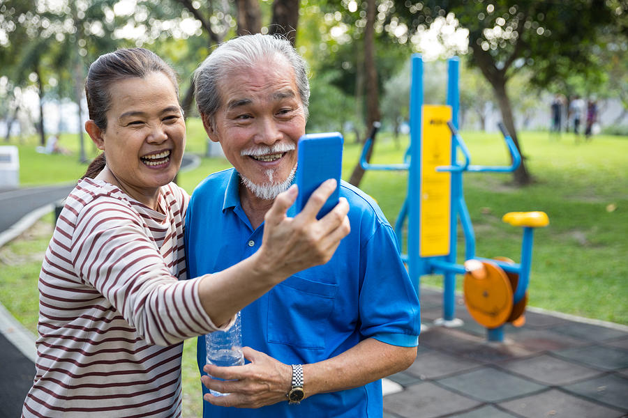 Active lifestyle, seniors taking a selfie after workout at the park Photograph by LeoPatrizi