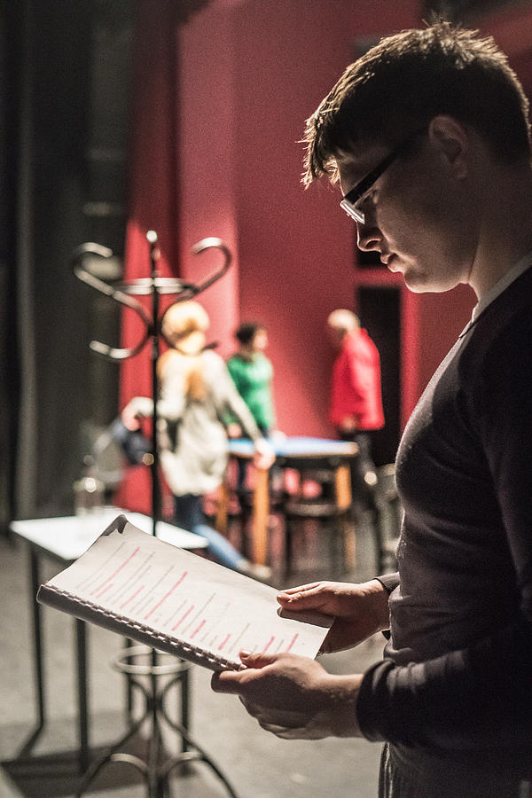 Actor Holding Script During Theatrical Rehearsal Photograph by CasarsaGuru