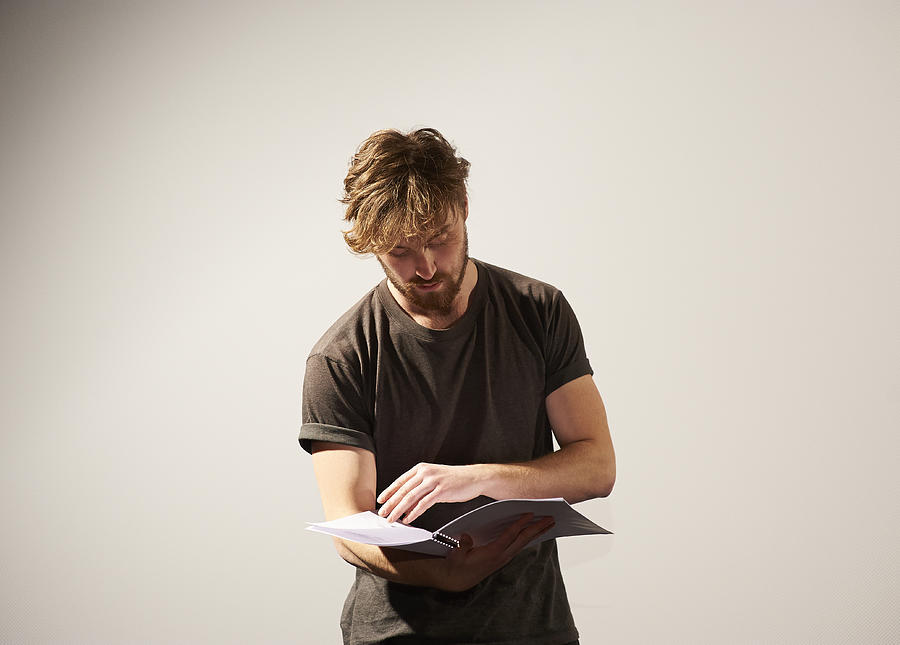 Actor reading script. Photograph by Dougal Waters