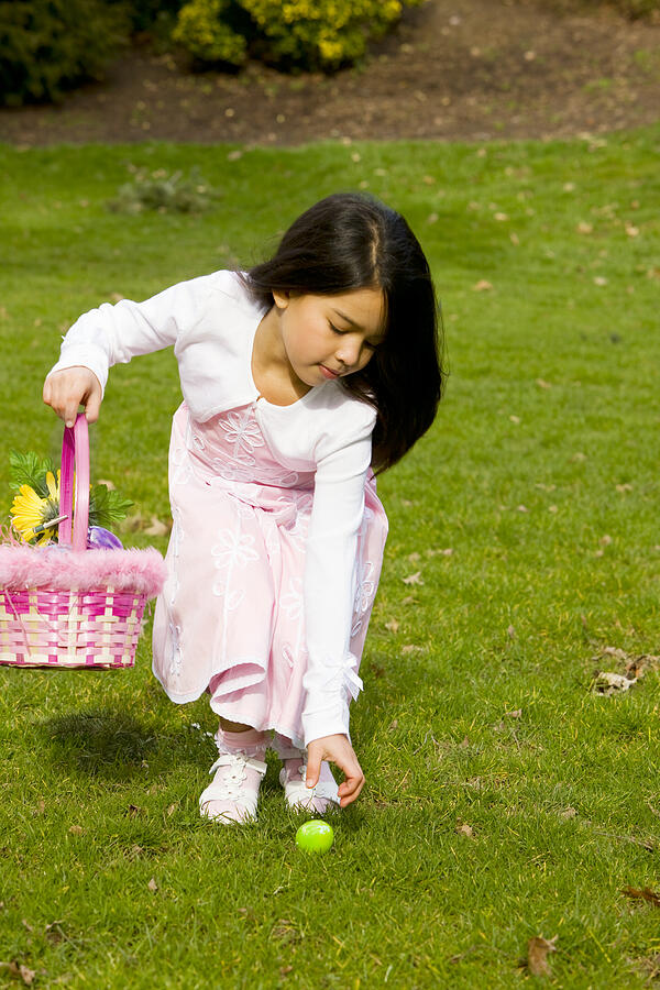 Adorable Little Girl on Easter Egg Hunt Outdoors, Copy Space Photograph by Quavondo