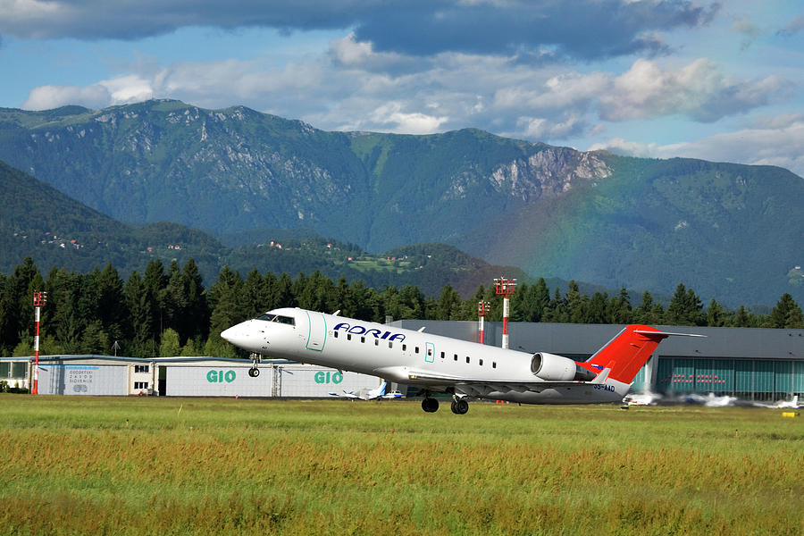 Adria airplane taking off from Ljubljana Joze Pucnik Airport, Sl Photograph by Ian Middleton