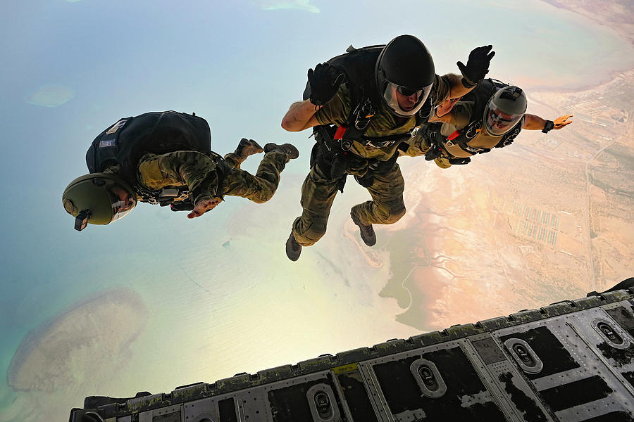 Aerial Action Airmen perform a high altitude low opening jump from an ...